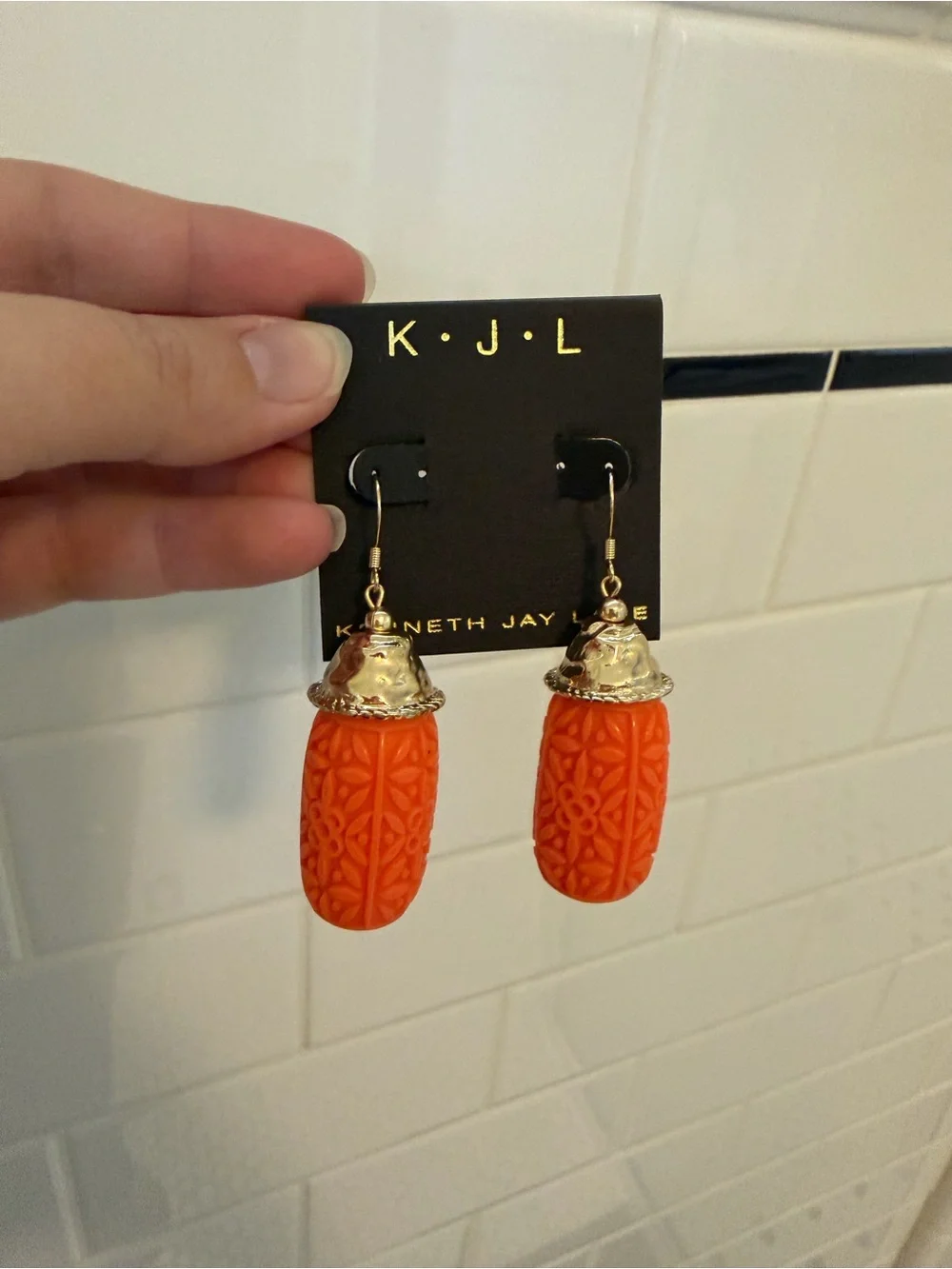 Kenneth Jay Lane Orange Carved Drop Earrings with Gold Caps - Picture 2 of 2